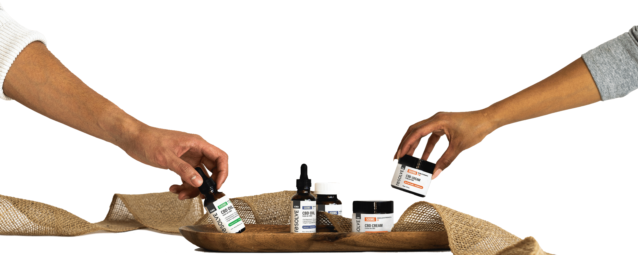 Resolve CBD products on a plate with hands reaching out to gram them